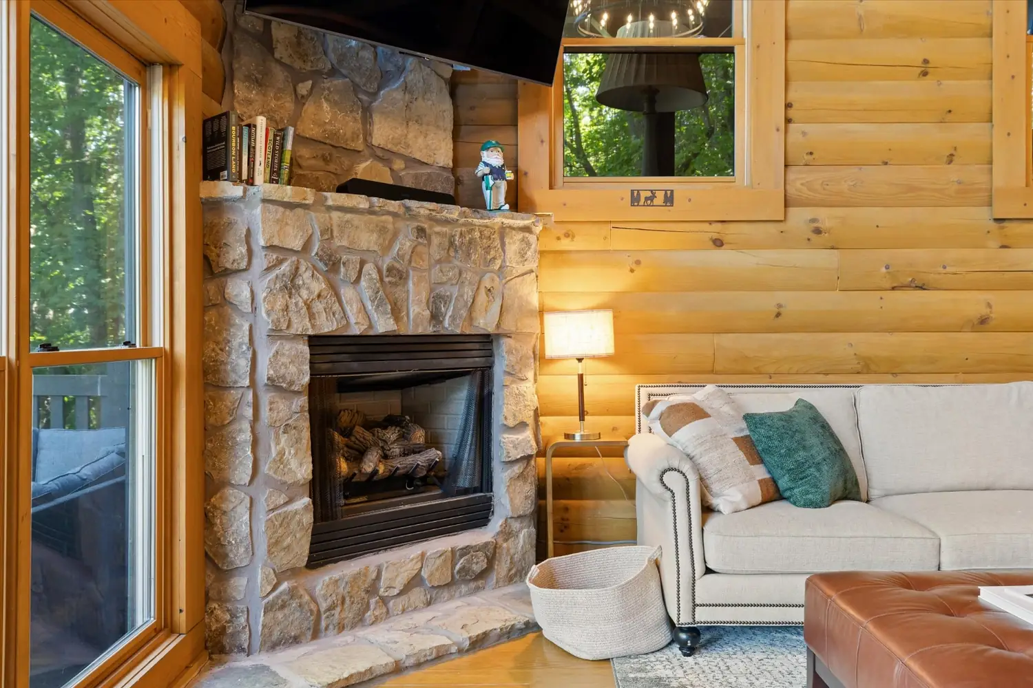 Stone fireplace in the lower-level living room