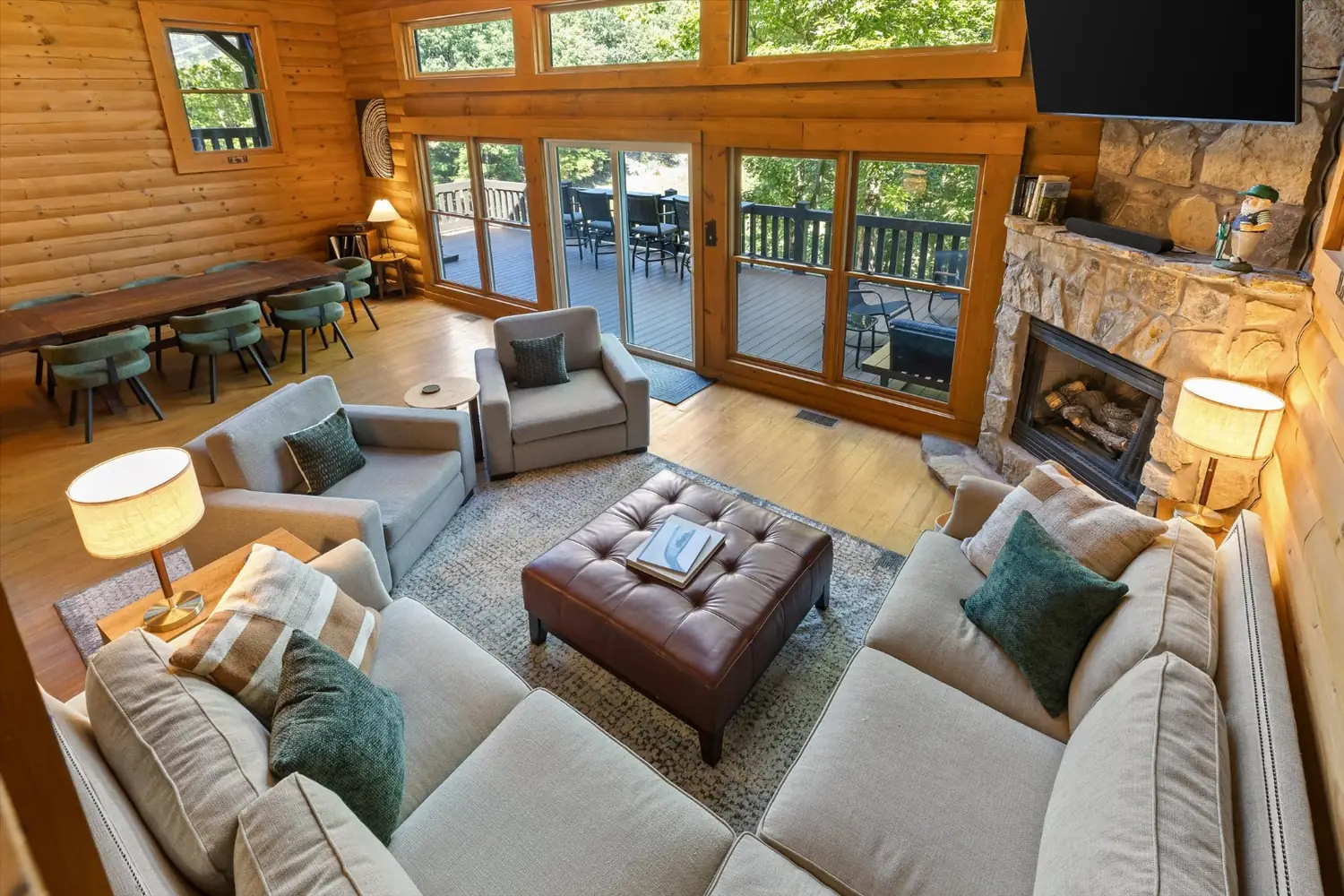 Great room with vaulted cedar ceilings and a fireplace